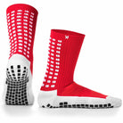 Full-length view of men's football socks paired with football cleats
