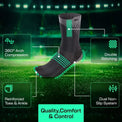 Athlete accelerating on the field wearing Performance Grip Cleat Socks inside cleats