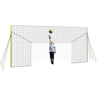 Football goal for kids with rebound net and backstop for backyard training.