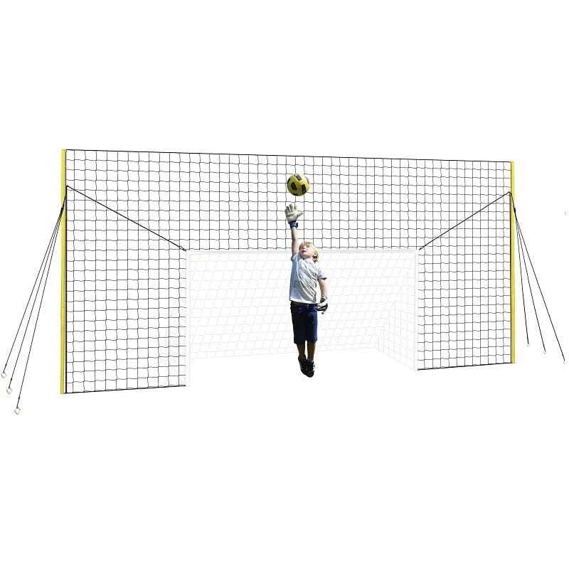 Football goal for kids with rebound net and backstop for backyard training.