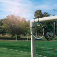 Set of corner targets installed on backyard football goal